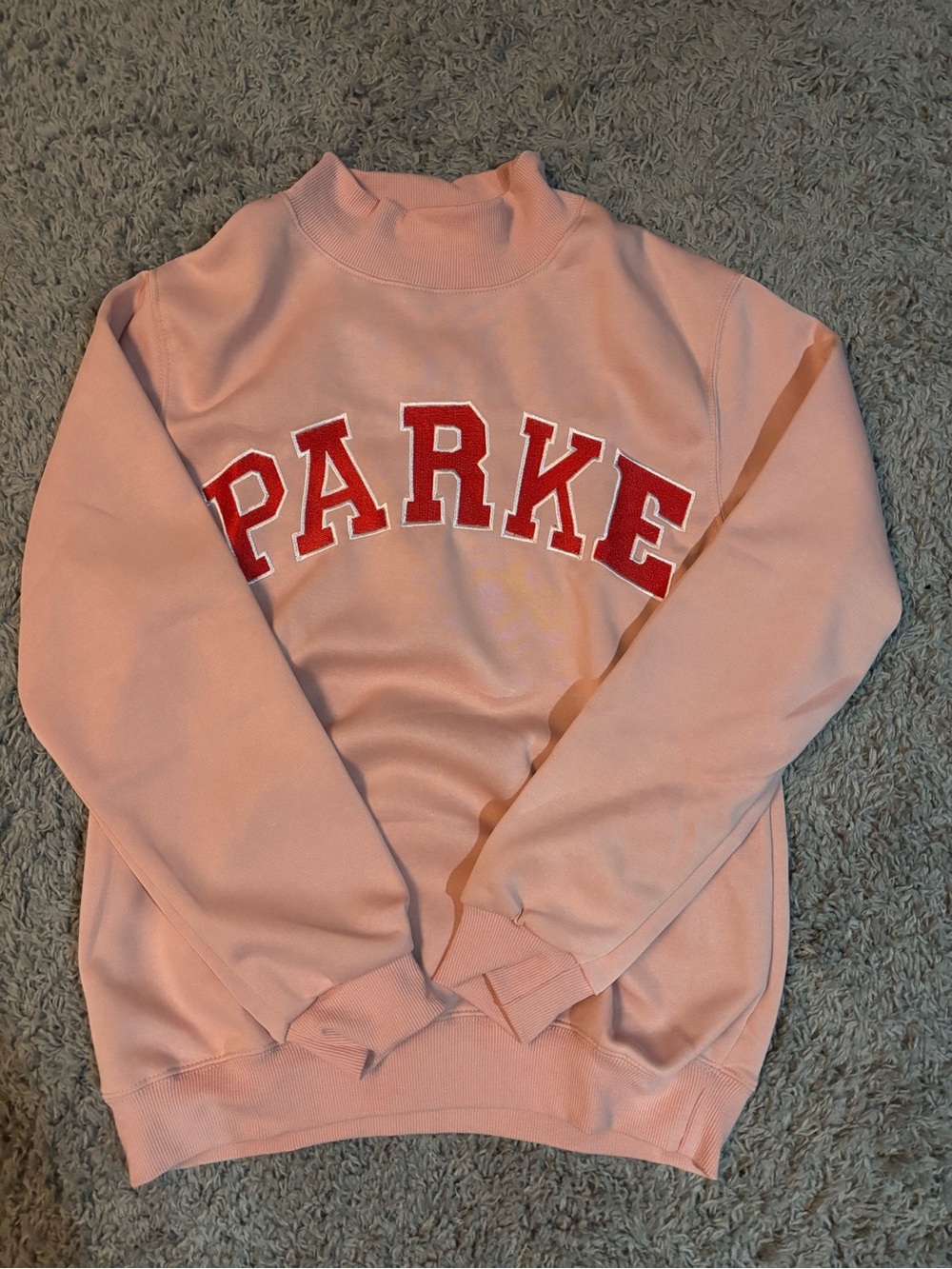 Pink and red sweatshirt